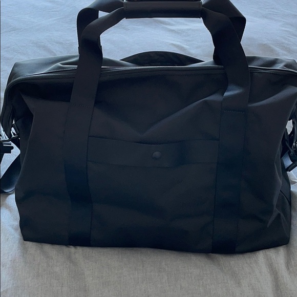 Tumi Handbags - TUMI Travel Satchel